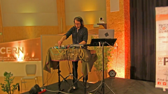 A DJ playing electronic music.